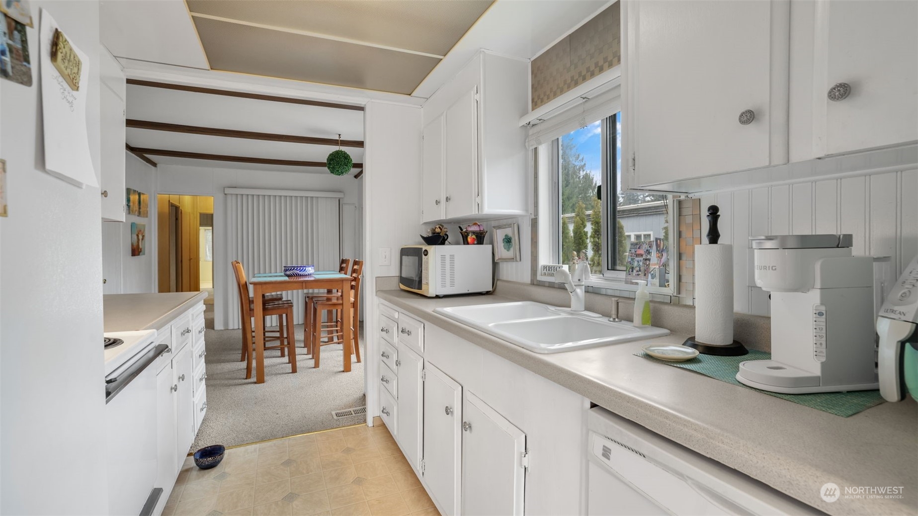 Window above the sink provides plenty of light.