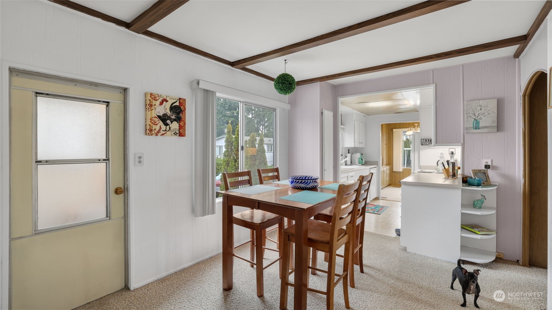 Informal dining area is conveniently located off the kitchen.