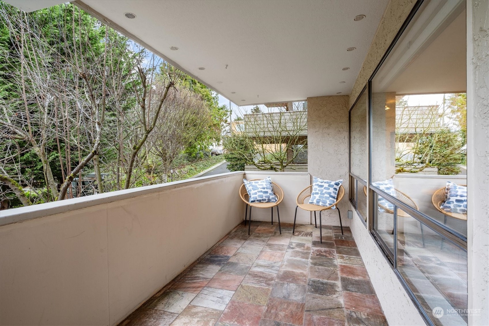 Large entertainment patio with a pretty territorial view