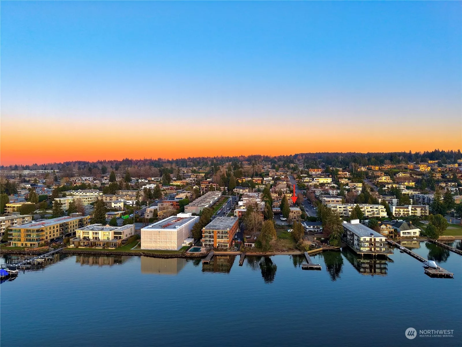 Nestled right by Lake Washington with stunning West facing views!