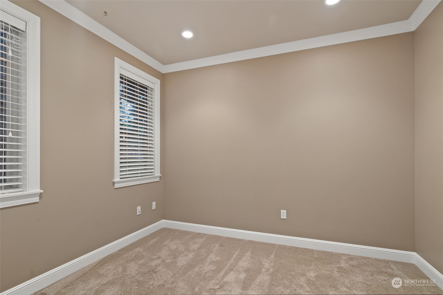 Main level guest bedroom with ensuite bath