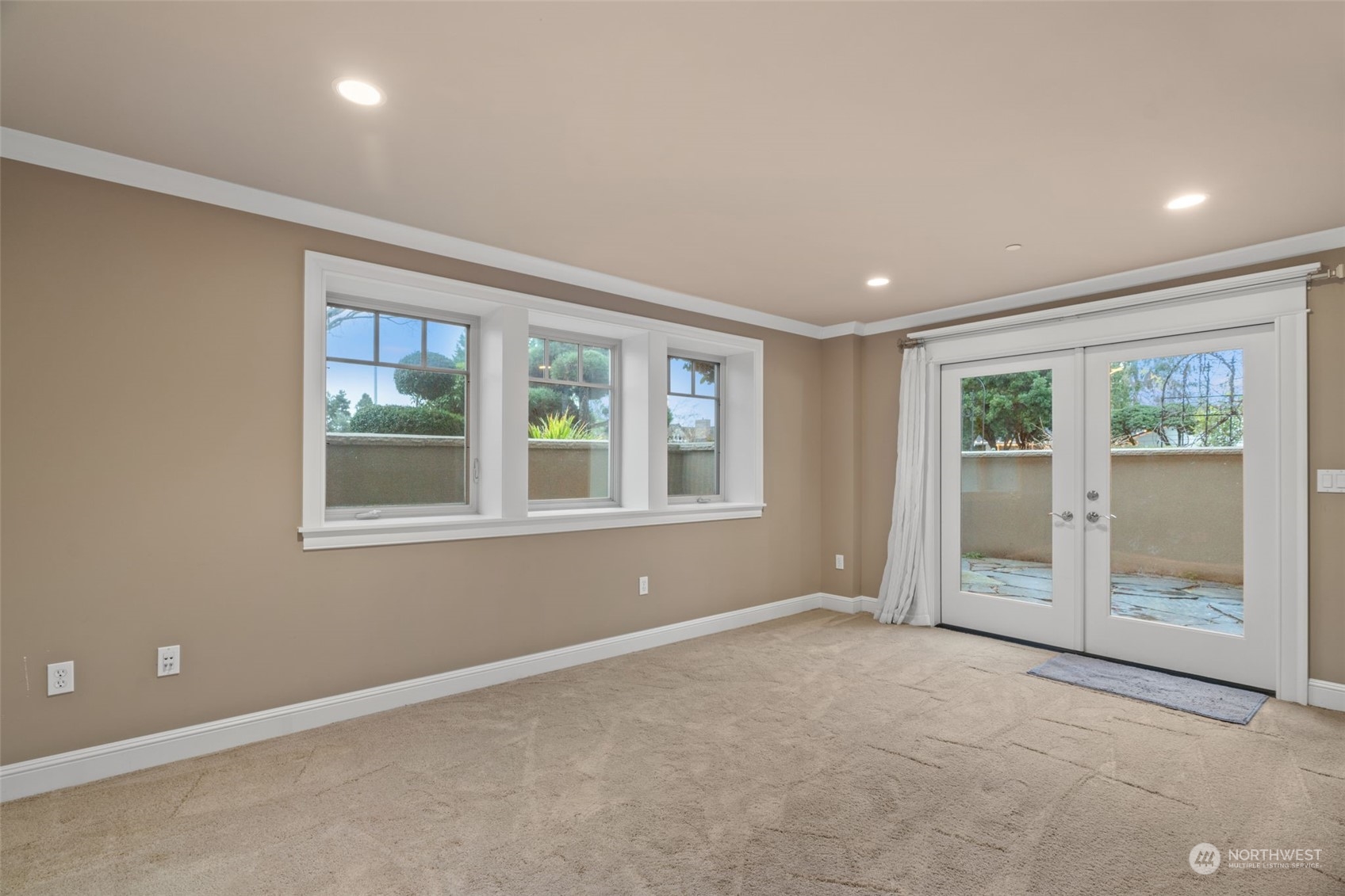 Lower level guest bedroom with ensuite bath