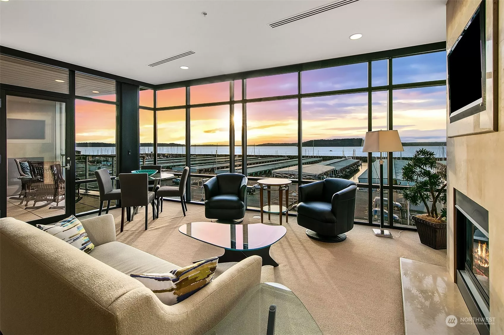 Glorious sunsets all year round.  The floor to ceiling windows greet you respectfully as you relax in the comfort of the 4 floor at The Waterford.  The Des Moines marina is a quiet community just south of Seattle.