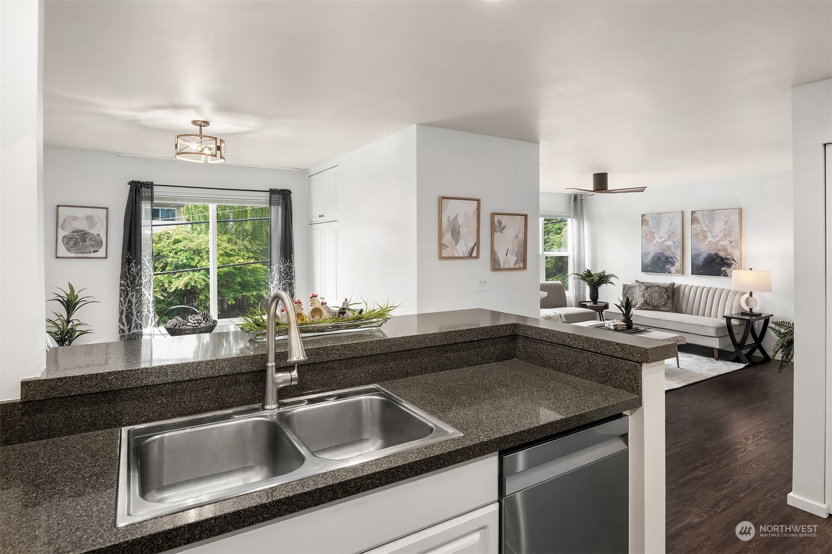 Kitchen with bar seating and and a dedicated dining room