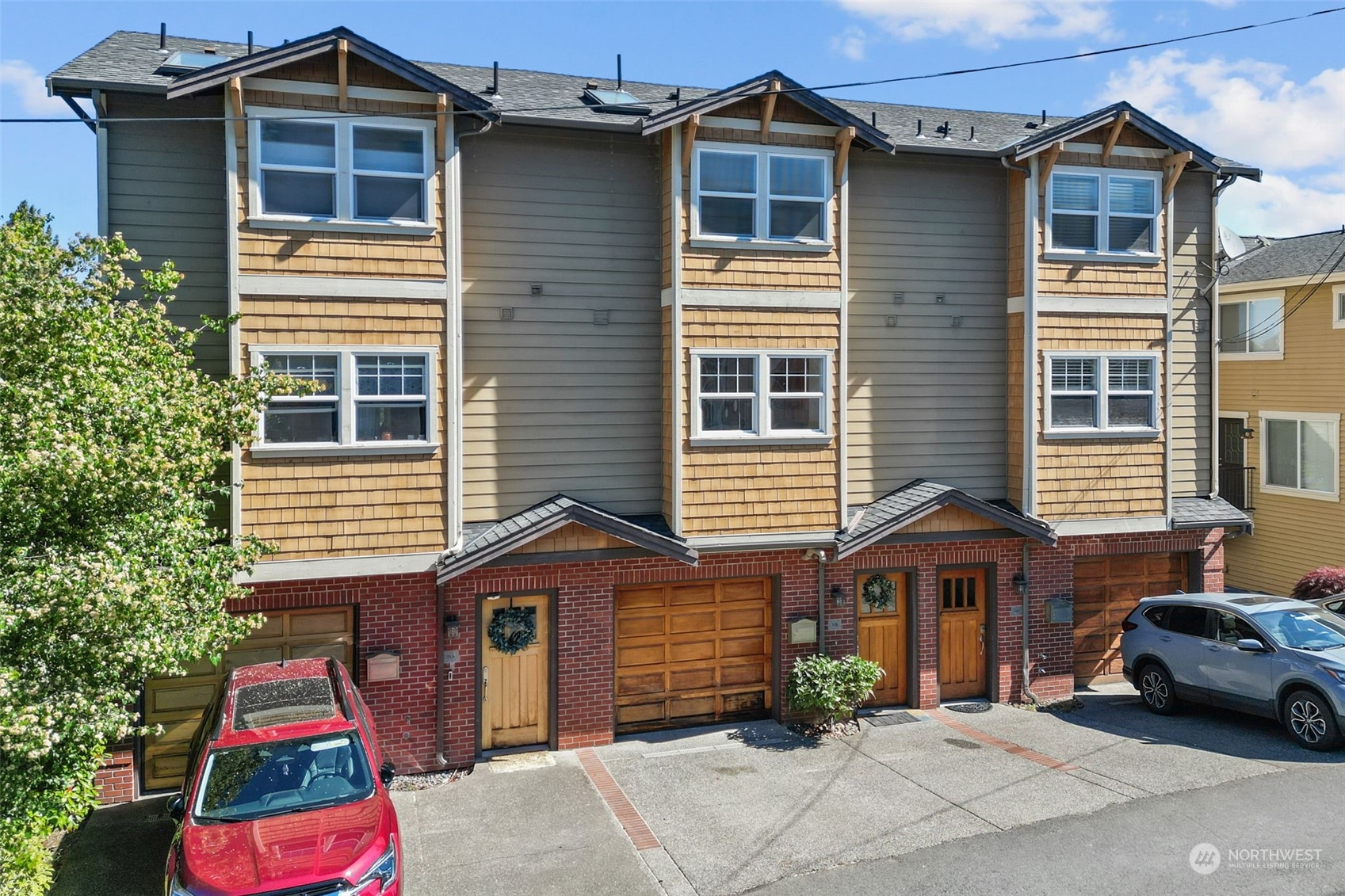 1 car automatic garage w/ off street parking in front of garage door.