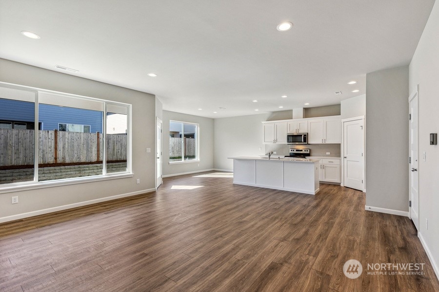 **Photos of simlar floorplan in another community. Features and specs will vary**