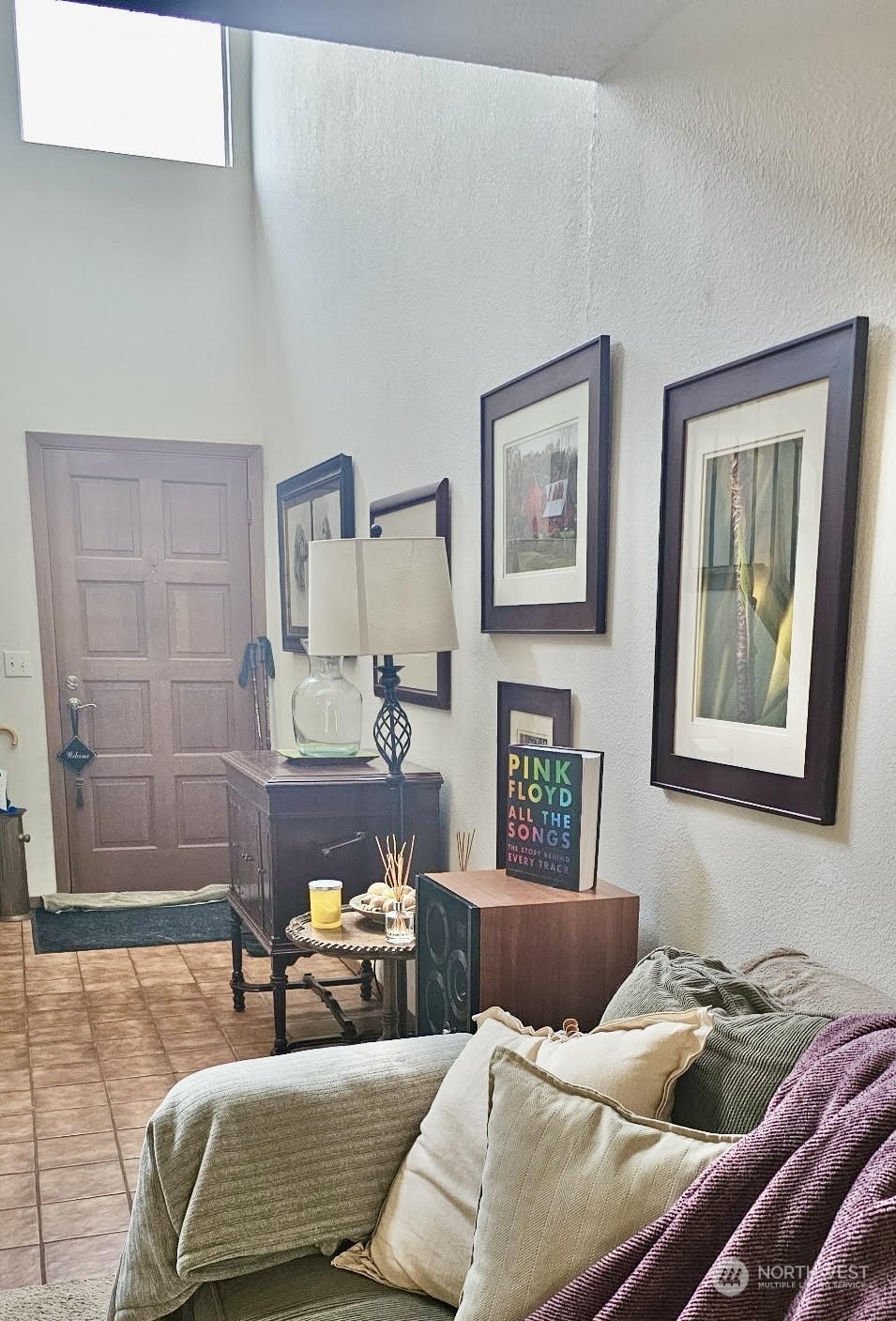 Two story foyer that opens to the living room.