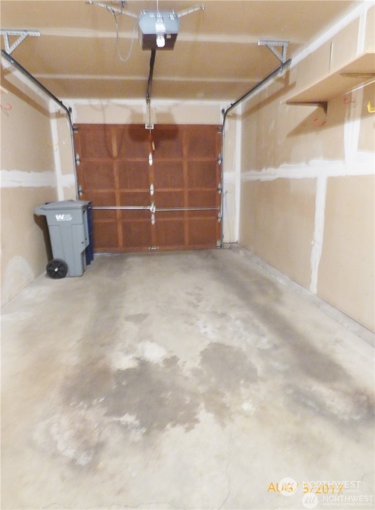 One car attached garage.    Photo from 2017 rental listing.