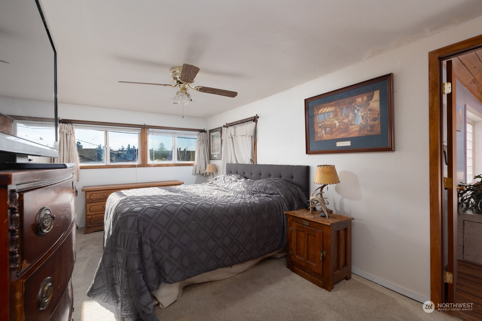 Lots of light and room for all the furniture you need, this second bedroom has a walk in closet and it's own door to the en suite bath.