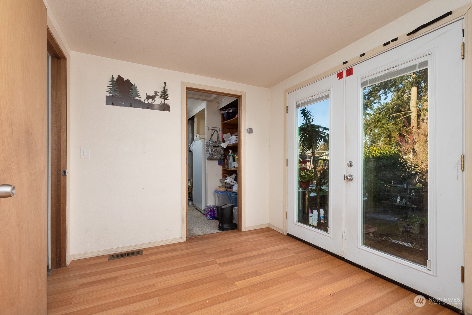 The third bedroom has access to the utility room.