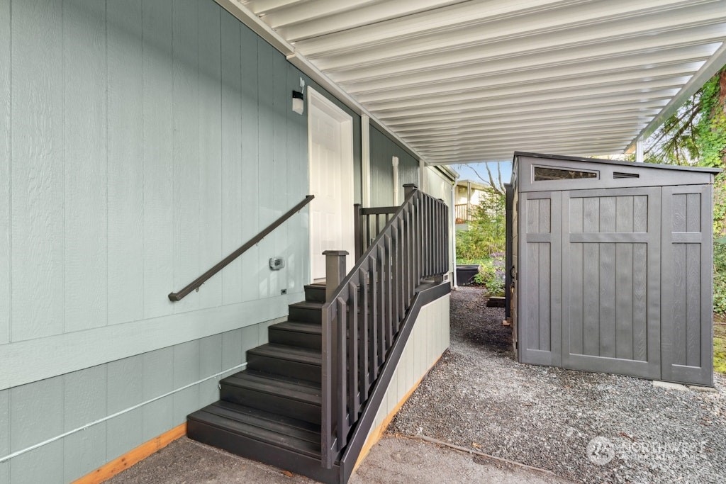 Side door next to sheds.