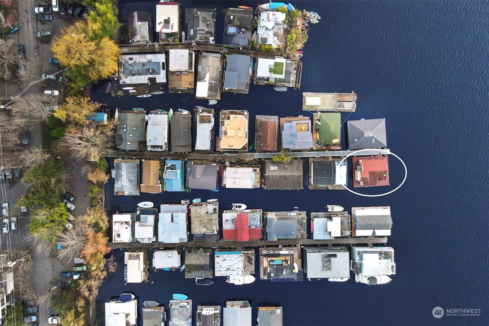 Tenas Chuck, the name of this dock, comprises of two docks and 32 homes.  The historic Floating Home Association office is located on this dock.