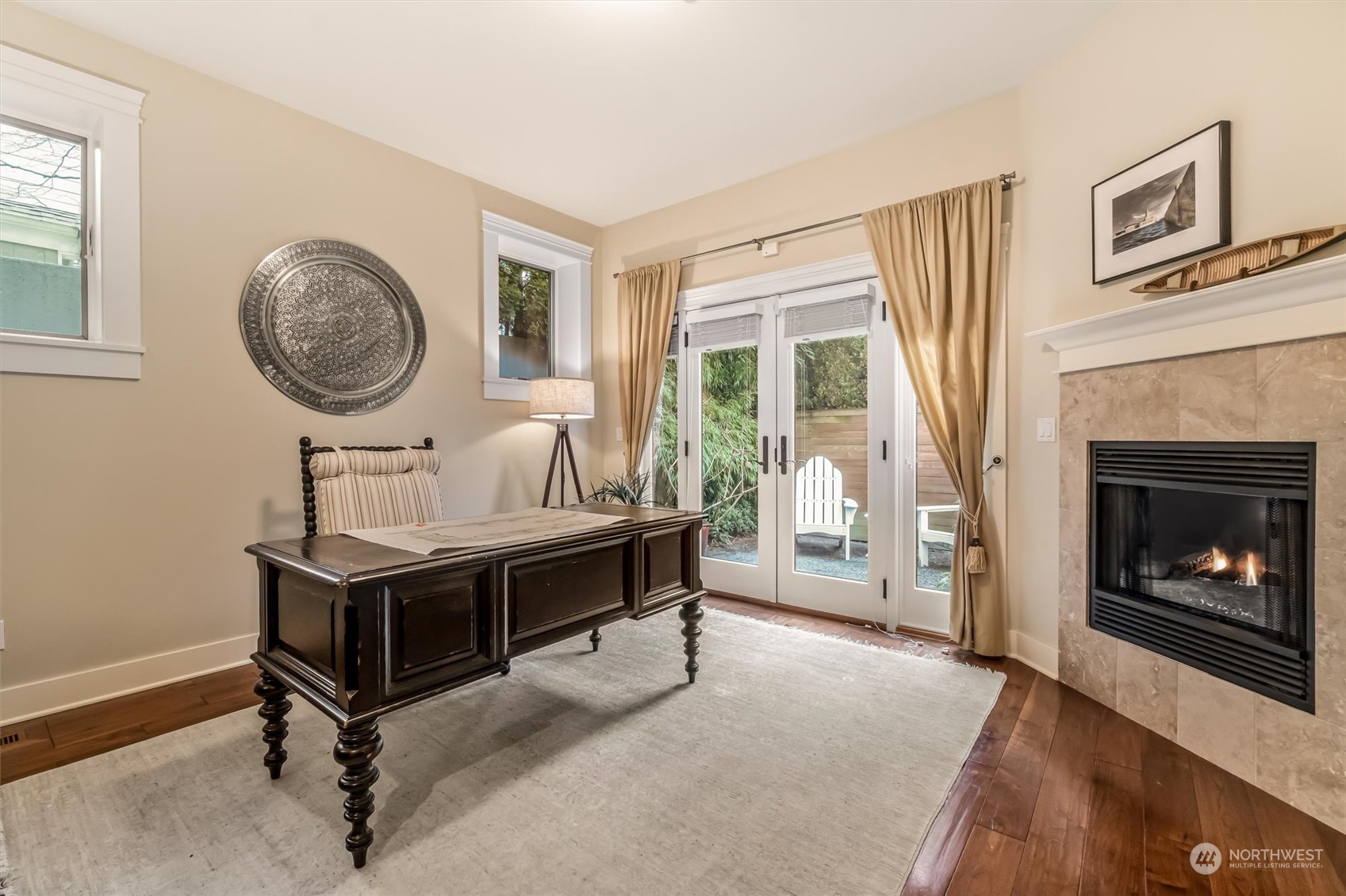 Bedroom with private bath and fireplace makes a wonderful office as well.