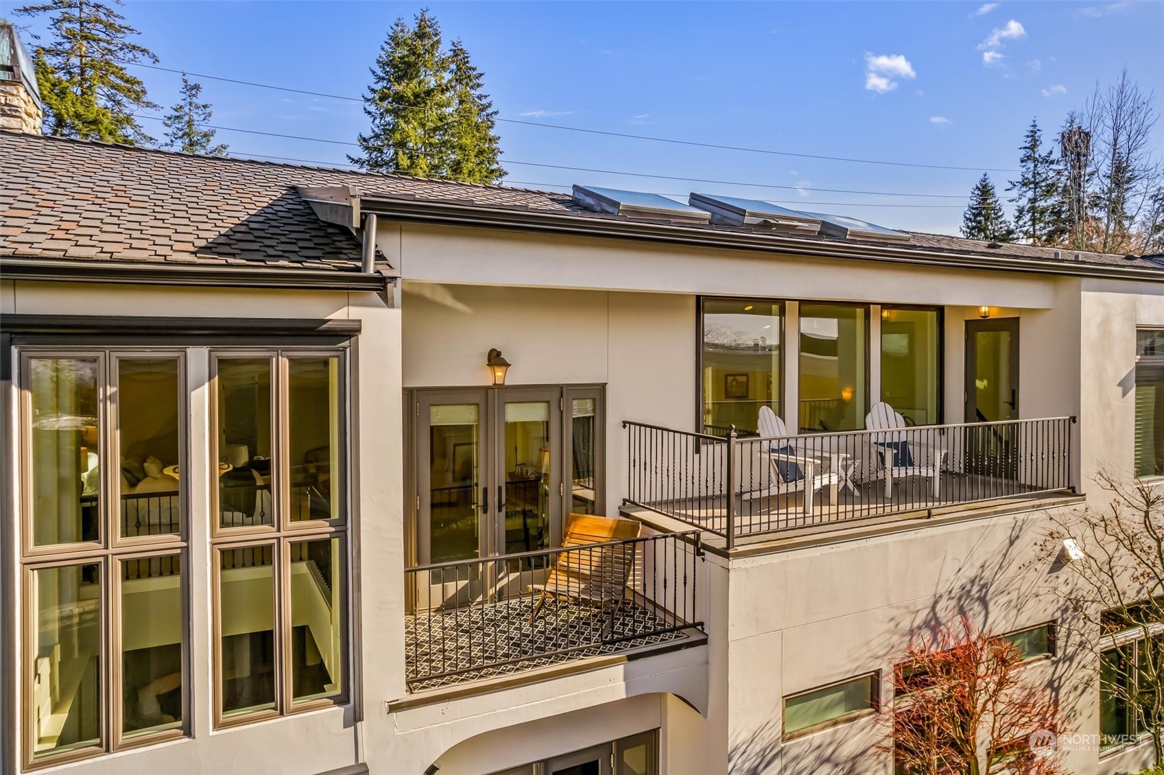 View of home facing the west.  See t he deck off the primary and the other deck for ultimate viewing as well.