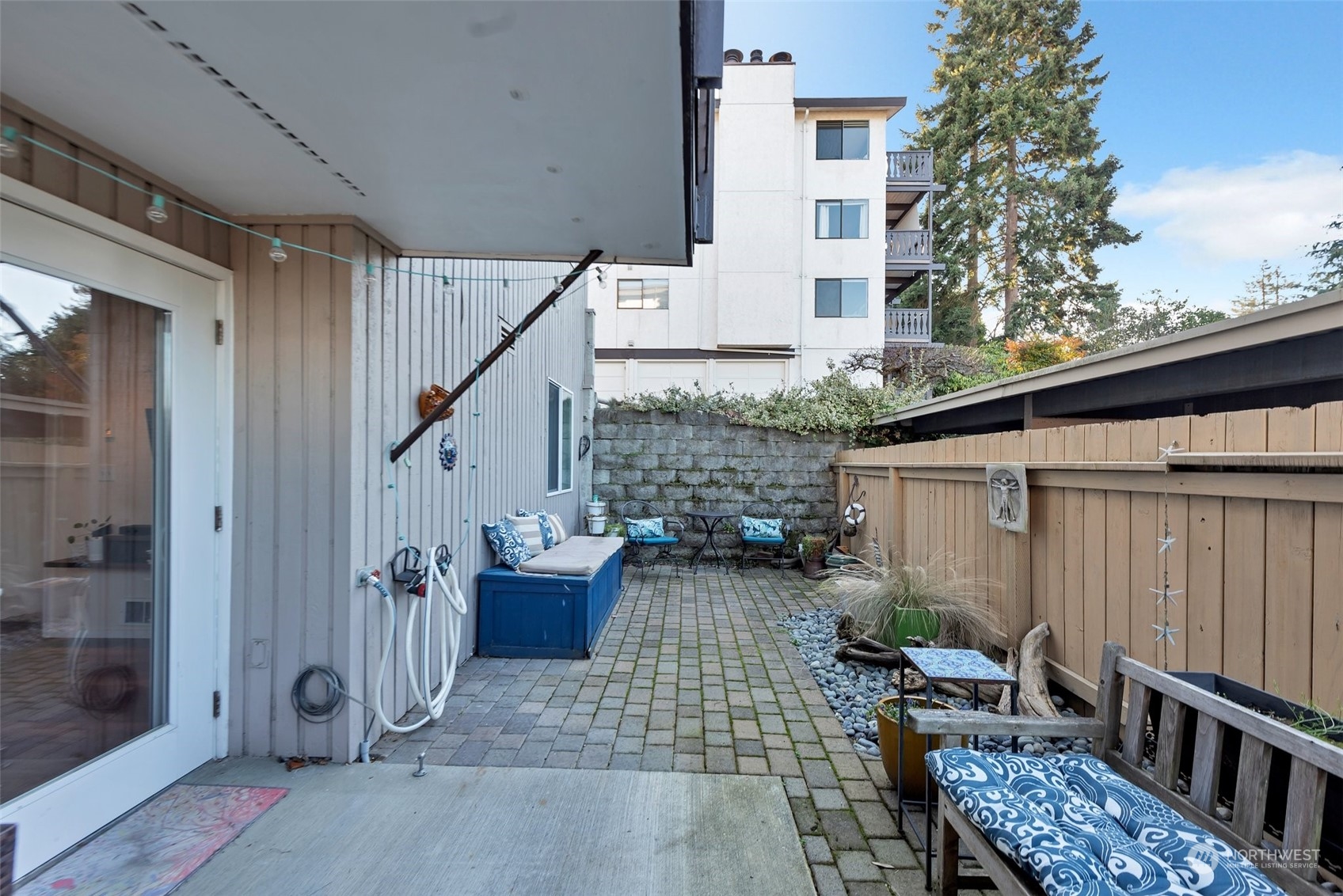 Private fenced walk out patio and yard