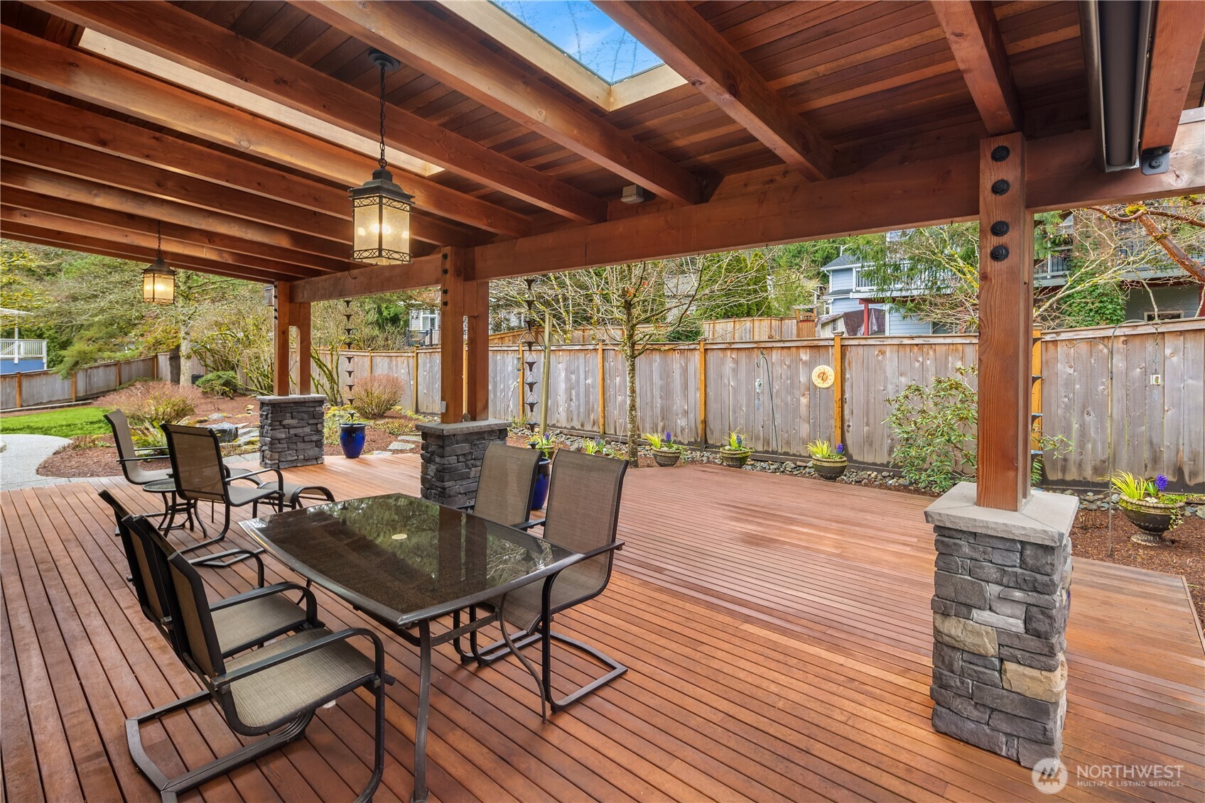 Stunning oversized cedar deck complete with skylights, electricity making this a cozy retreat in all seasons