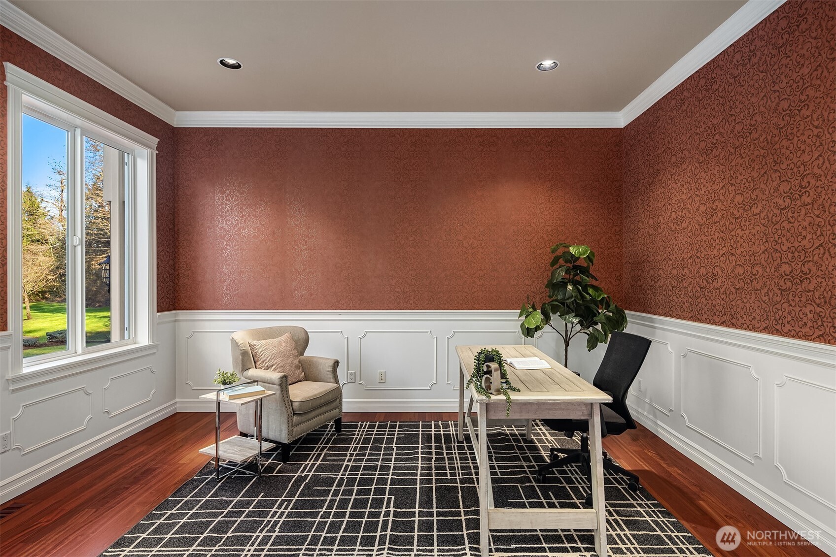 Executive main floor office, classically decorated with wallpaper