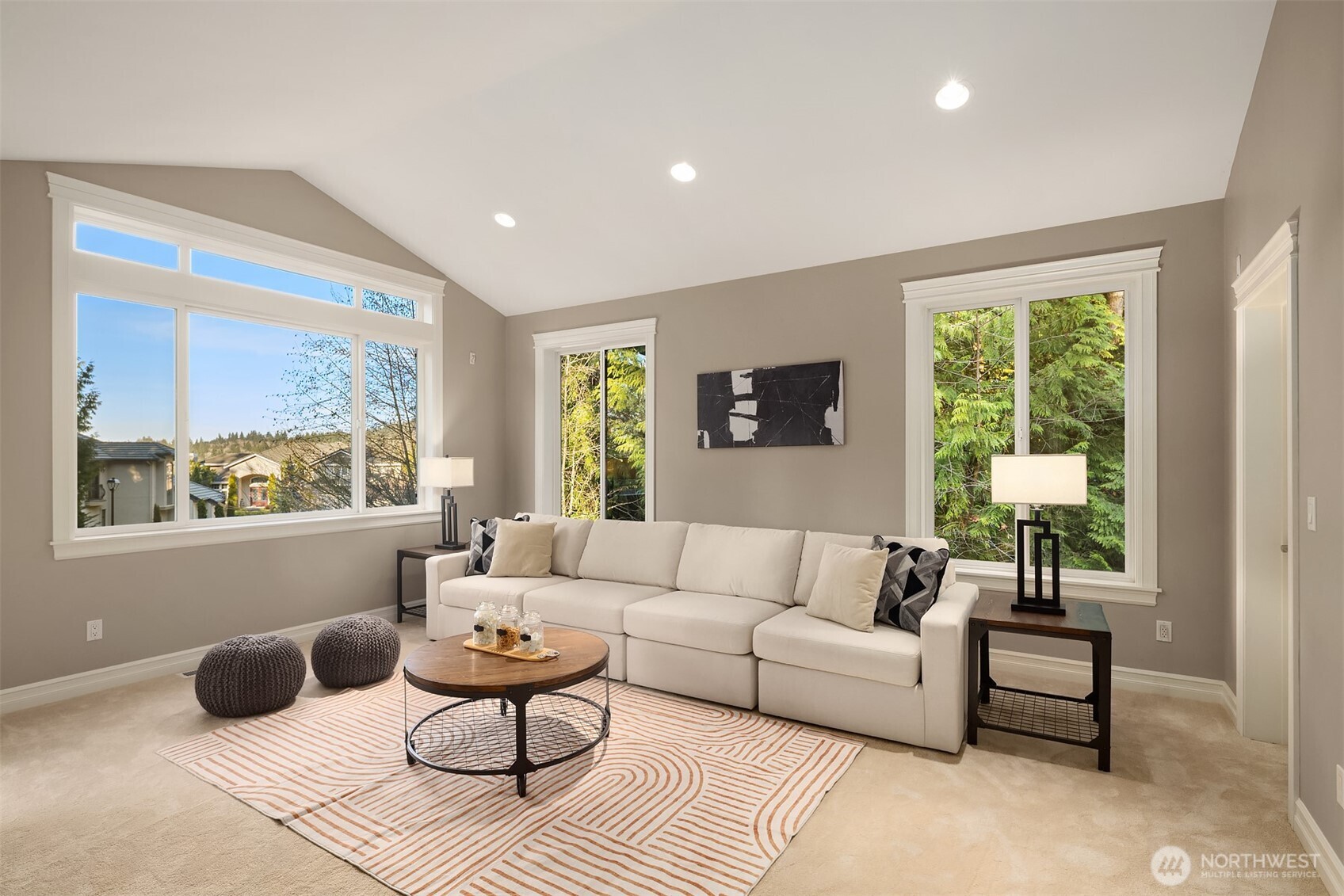 Staged as a media room, this is a legal 5th bedroom with walk in closet.