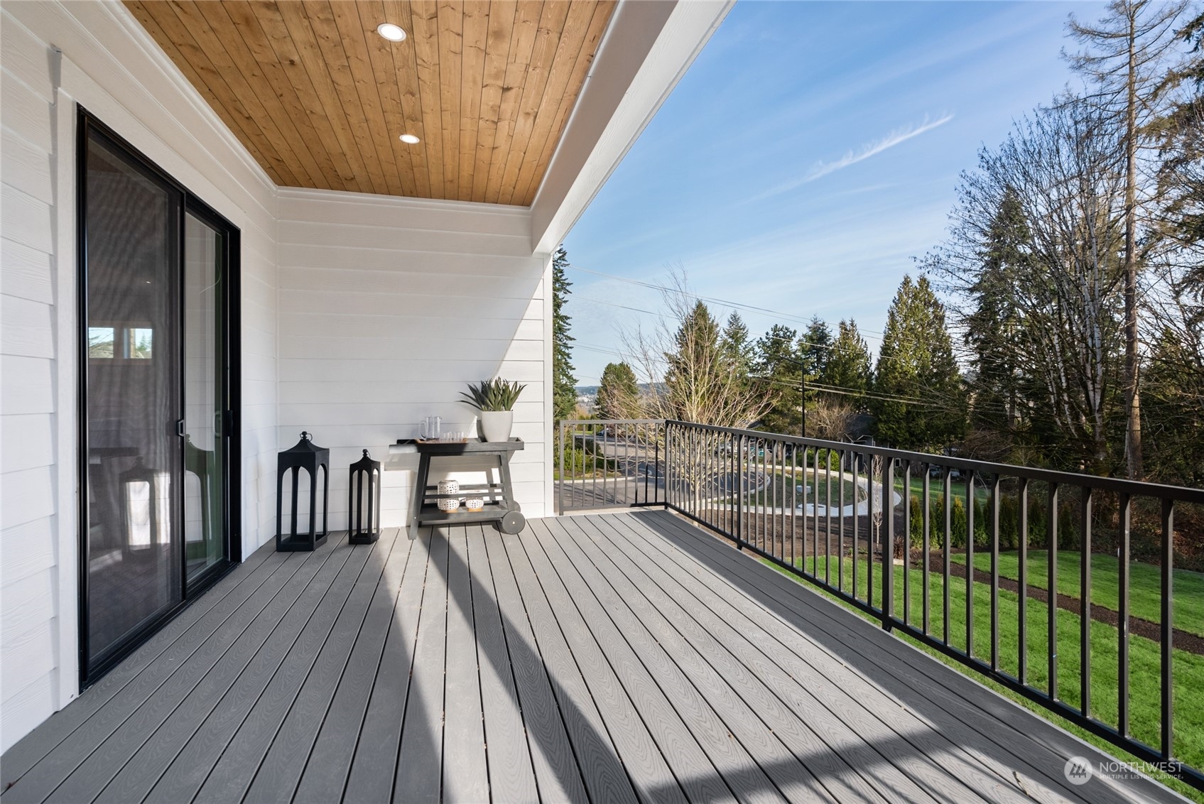 Spacious outdoor deck off kitchen, equipped with gas BBQ stub.