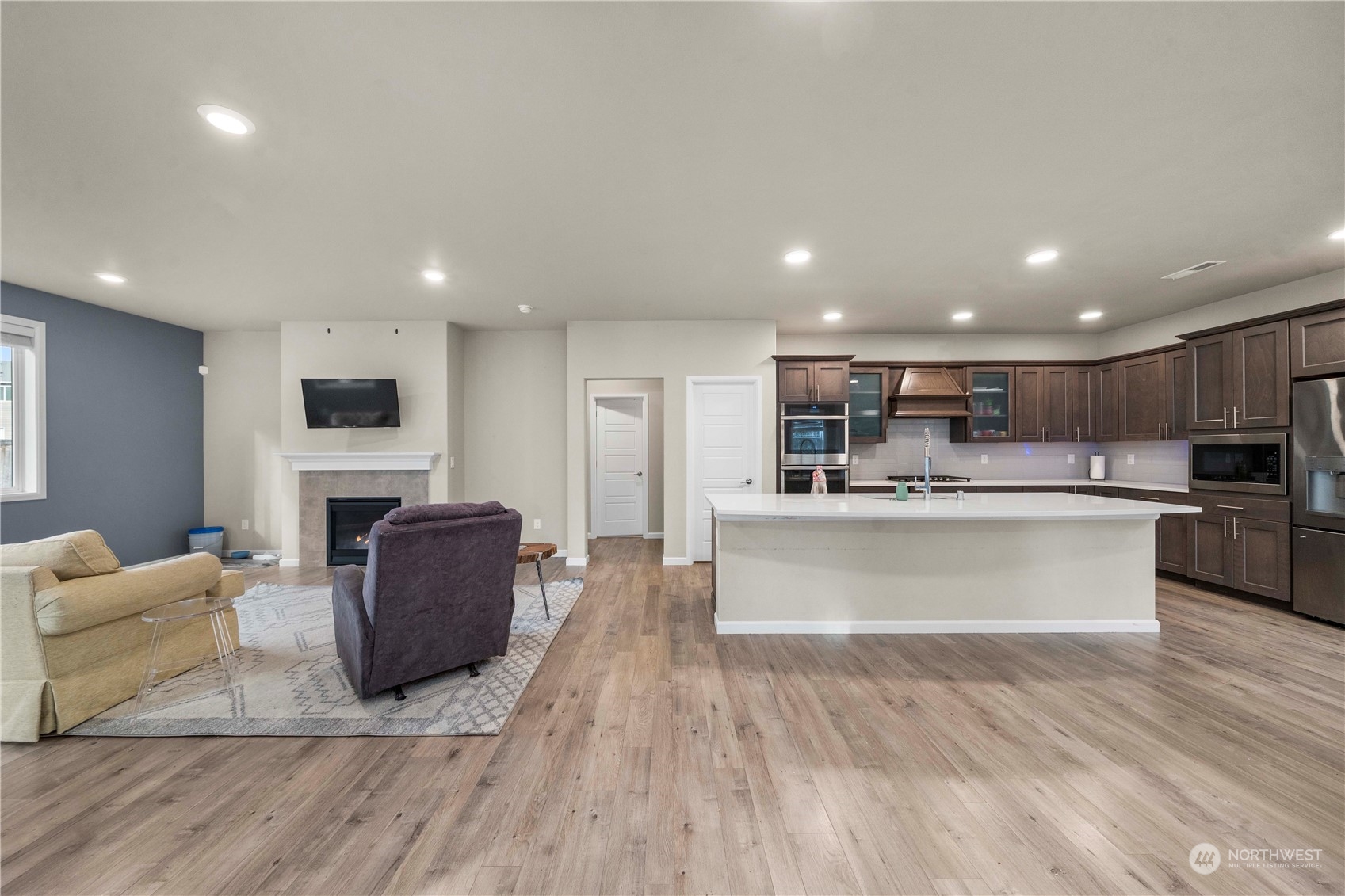 Beautiful flooring & Cozy Gas Fireplace