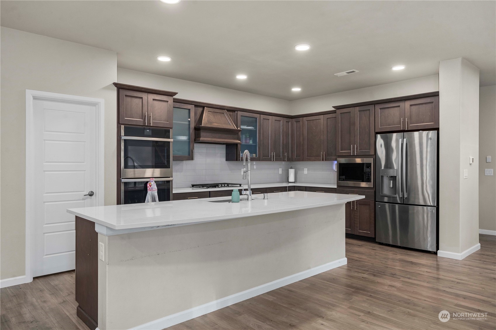 Gorgeous wood cabinetry with stainless steel appliances