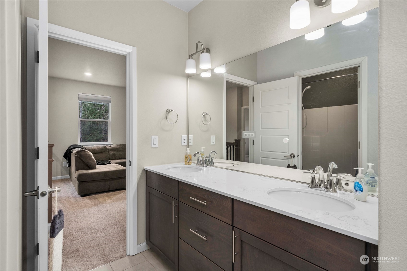 2nd floor bathroom centrally located with double sink vanity