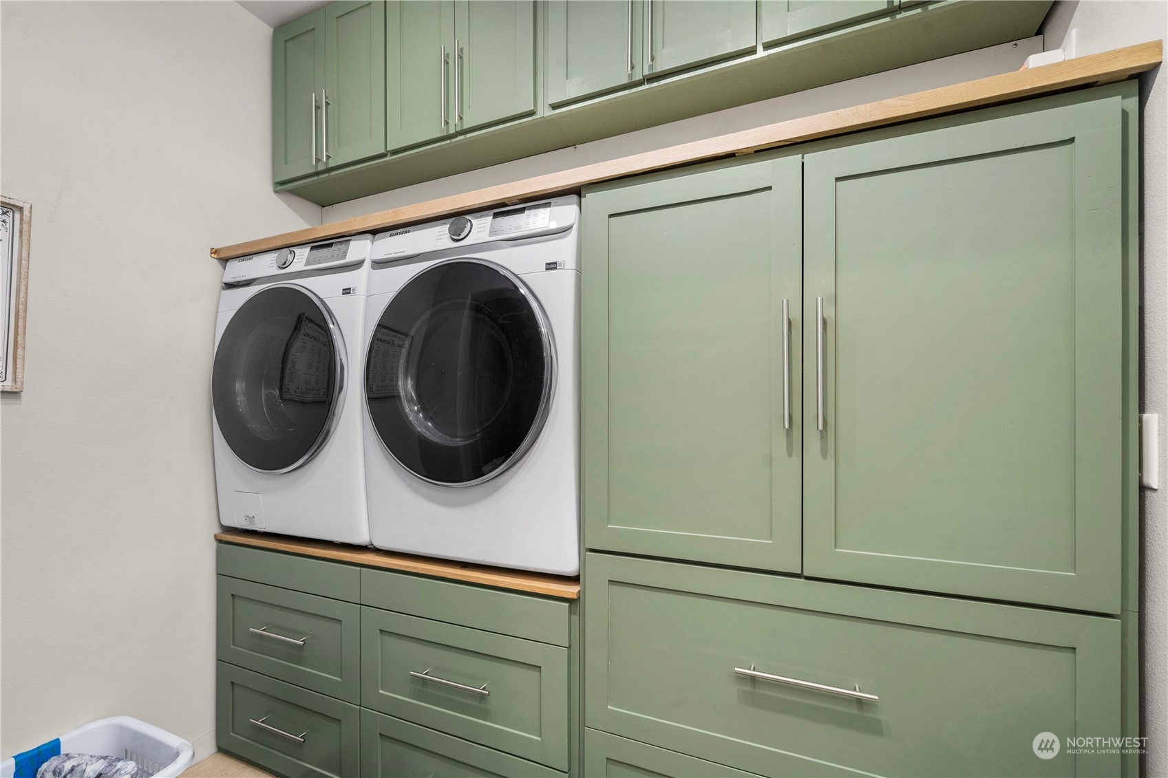 Custom large laundry room with TONS of storage!