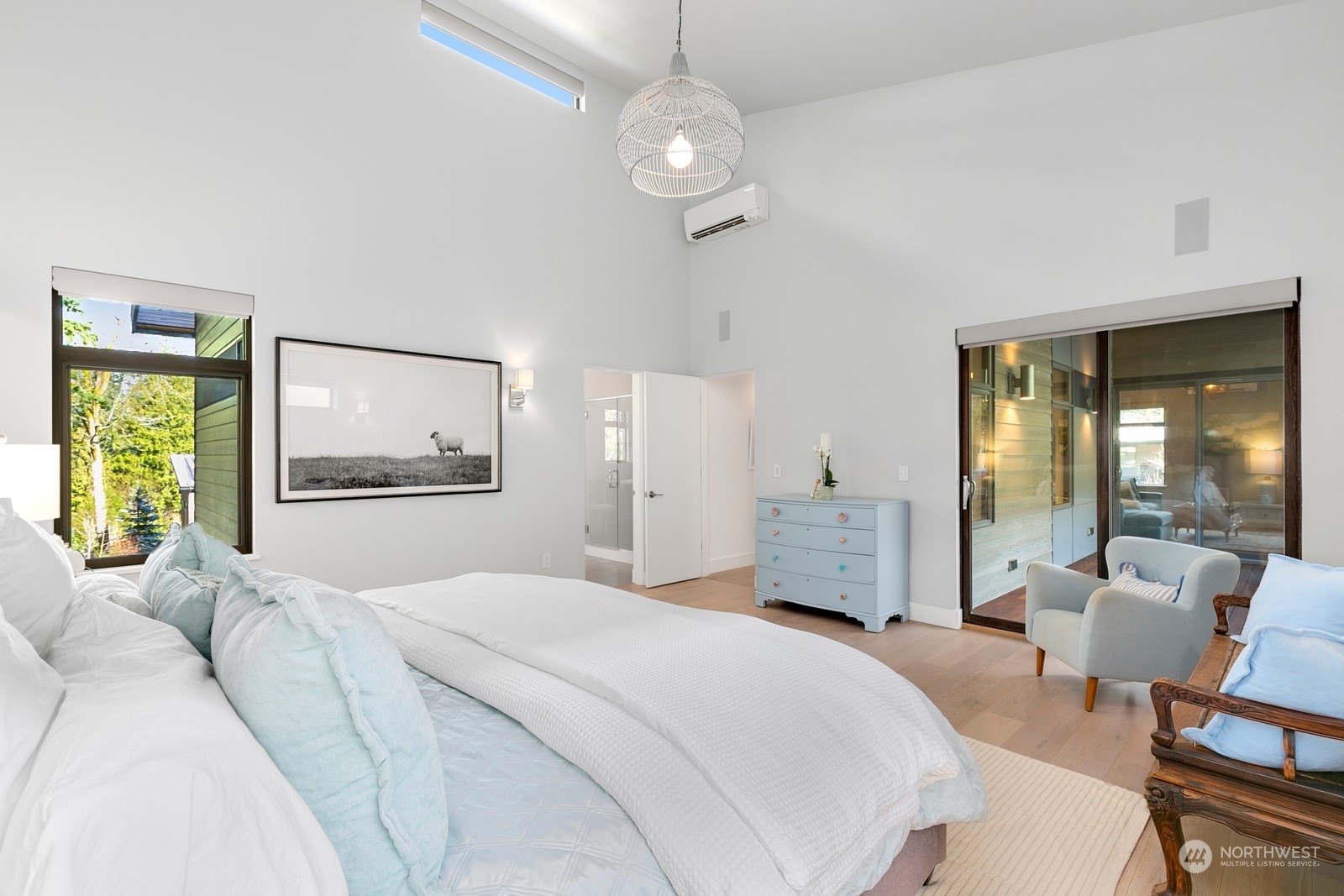 Another view of the primary bedroom, with access to the covered Brazilian teak deck