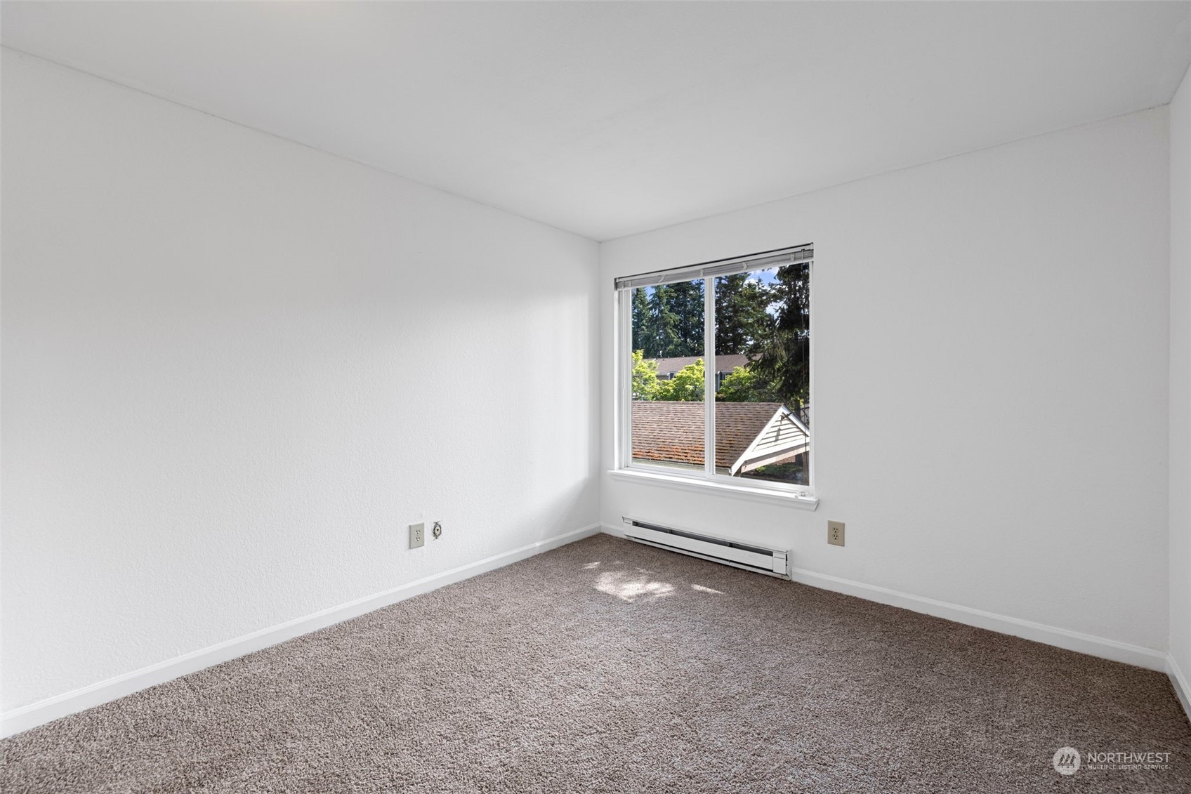 Two additional upstairs bedrooms with fresh paint and ample natural light!