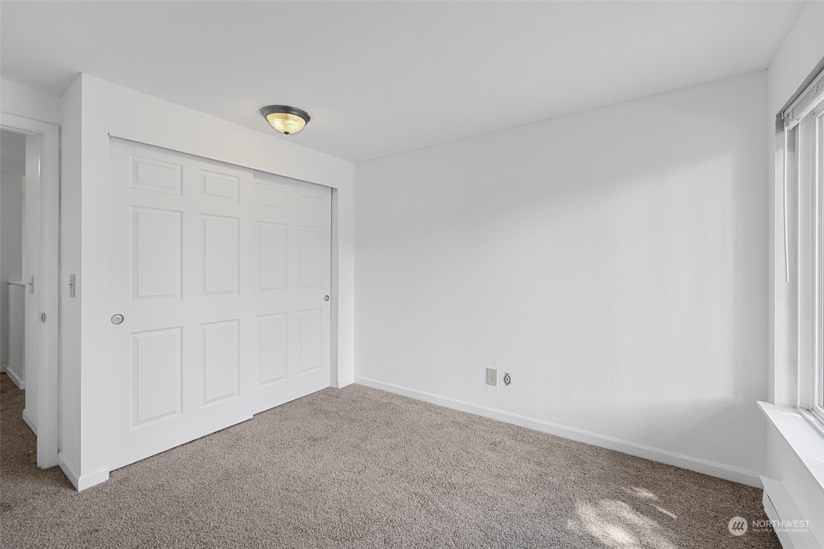 Two additional upstairs bedrooms with fresh paint and ample natural light!