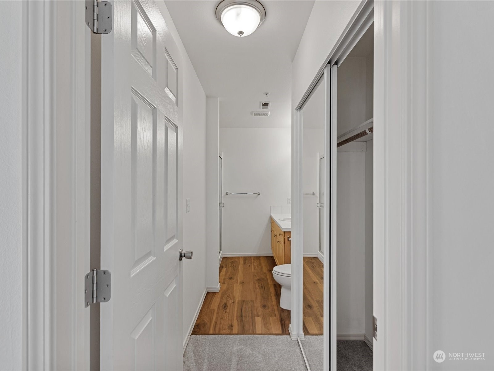 Closet between primary and en-suite bath.