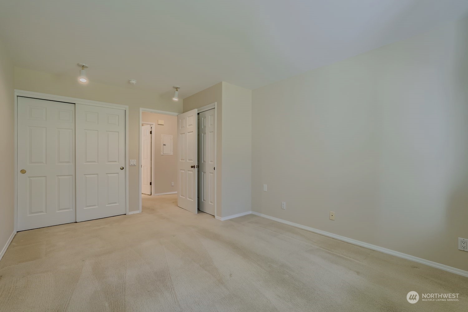 Two closets and lots of light in the main bedroom.