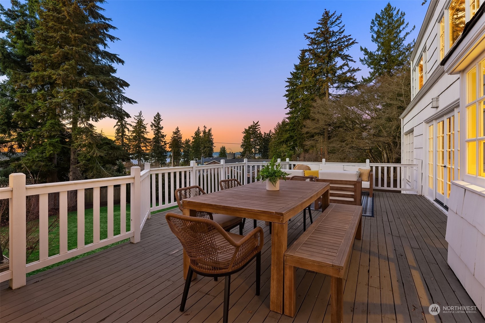 Featuring Westerly views, the entire back yard enjoys amazing all day sun + sunsets