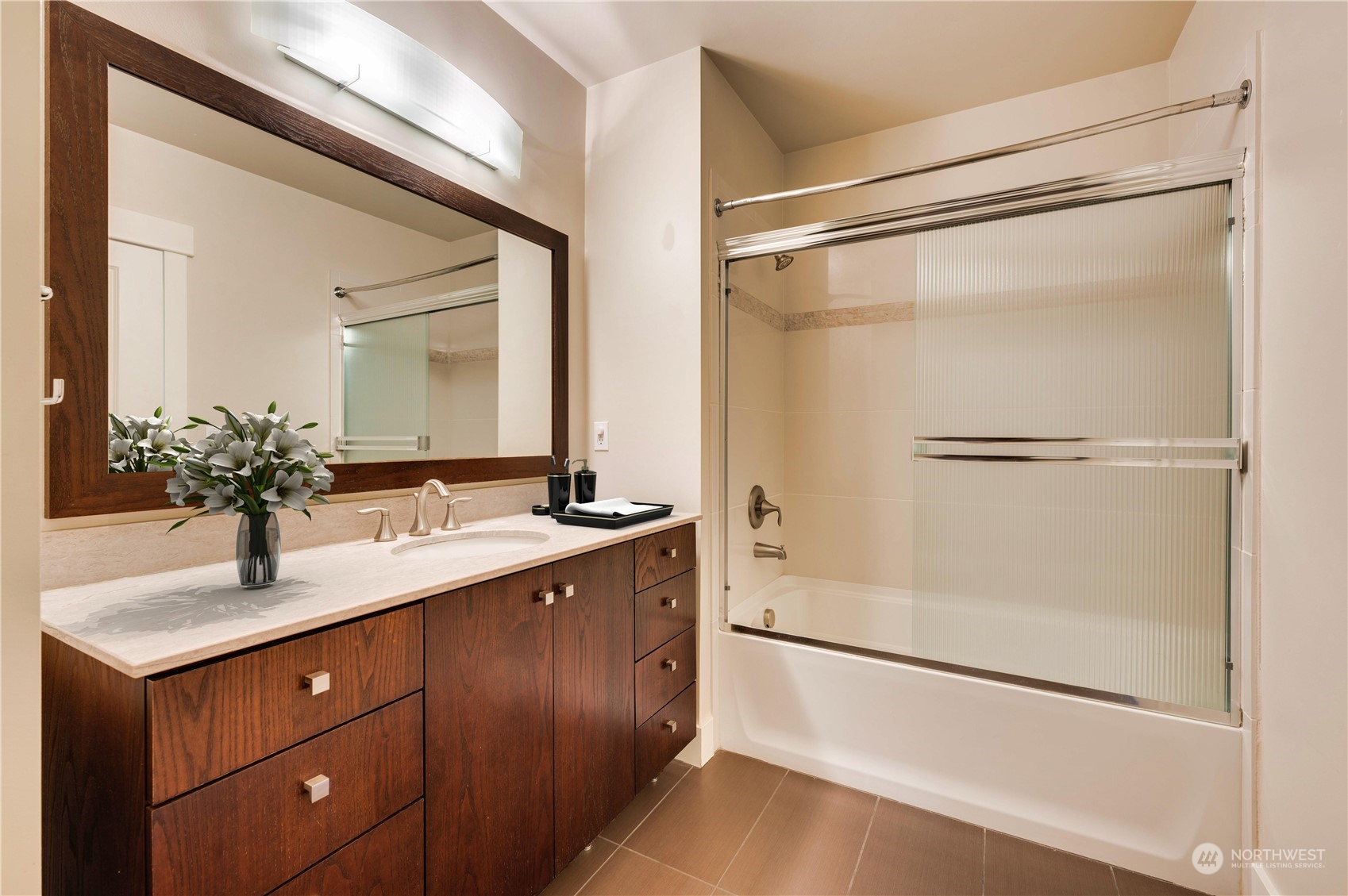 Lovely guest bath is next to the guest bedroom for convenience.