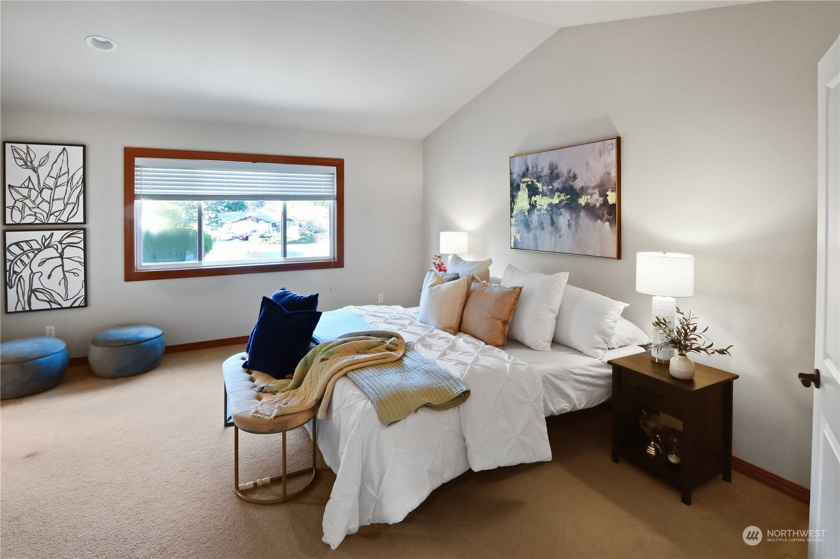 Upstairs main bedroom has vaulted ceilings. Floor plan shows size of this generous room.