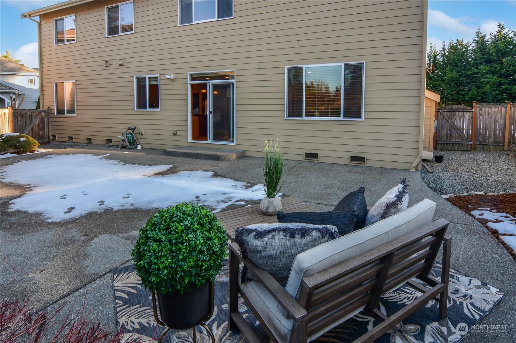 This large patio is so much better than a wooden deck. So easy to maintain with a pressure wash each year.