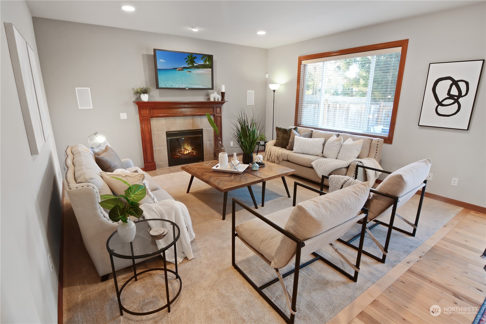 The TV room adjoins the eating space and kitchen creating an ideal open plan great room that is so prized. The gas fireplace will warm your evenings in this cozy room.