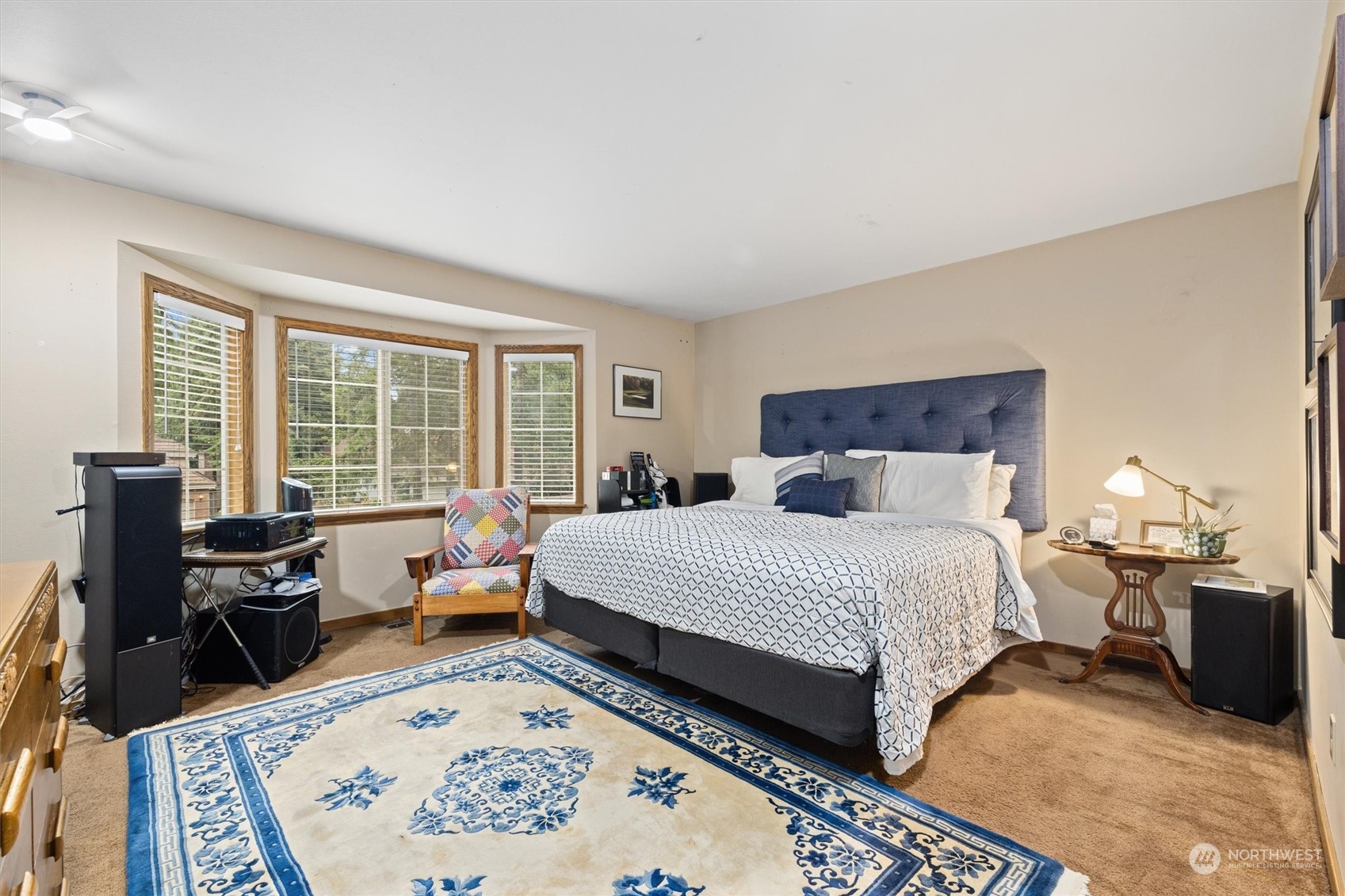 Large Bedroom with Bay Window and View of Front Yard