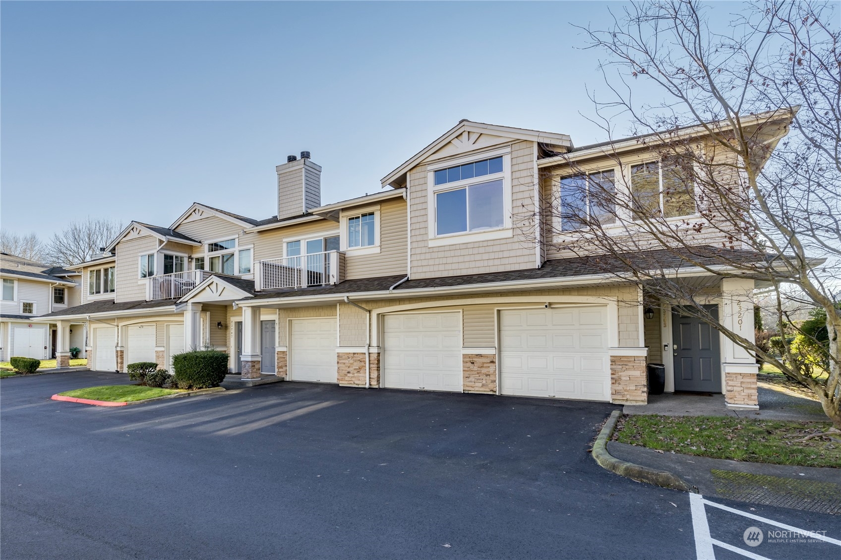 Convenient attached 1-car garage has an extended storage area in the back