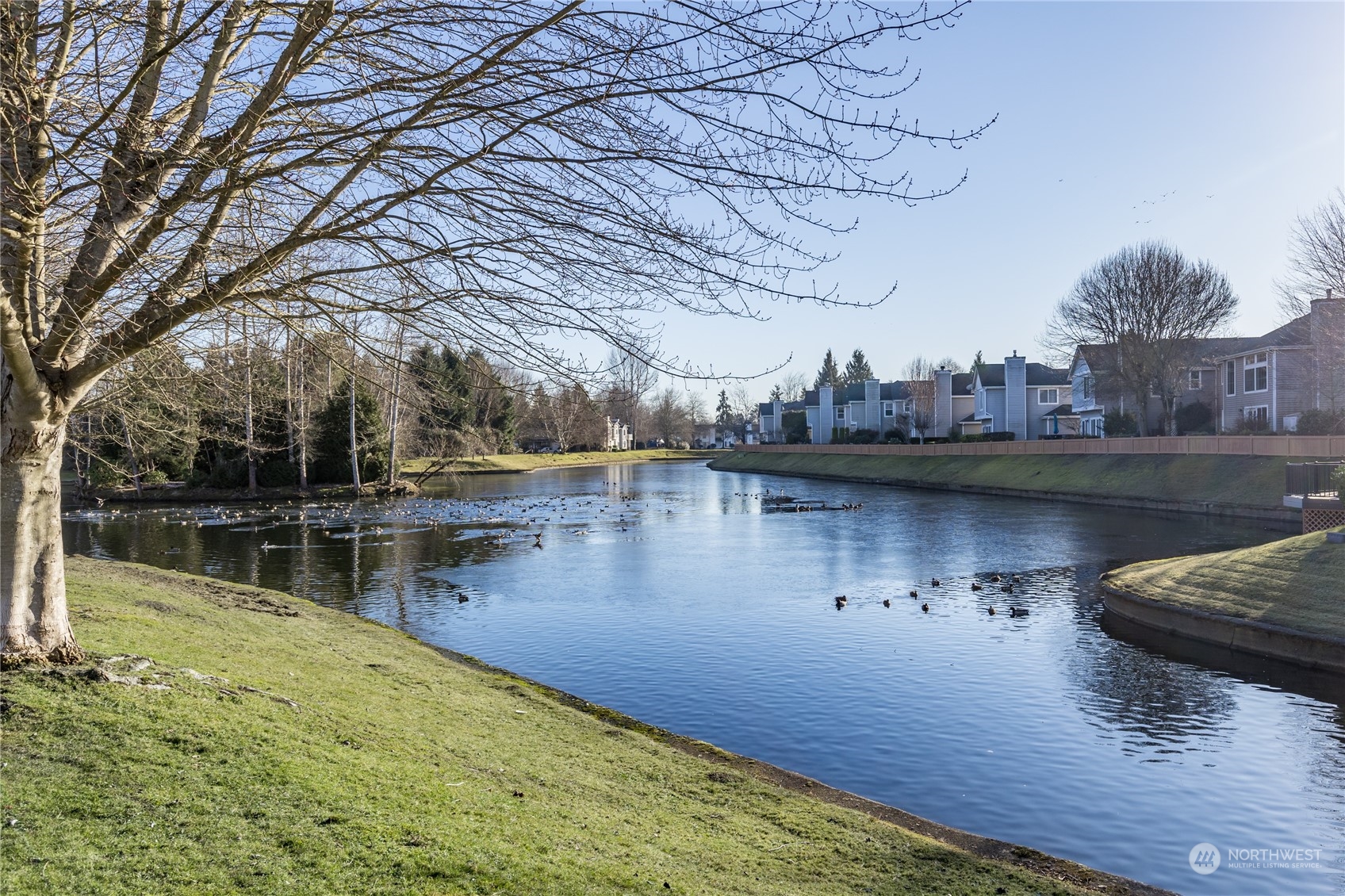 Right across the street is this lovely lake with abundant waterfowl, just one of several water features in the neighborhood. There are abundant parks, trails and sidewalks throughout the community for you to enjoy.