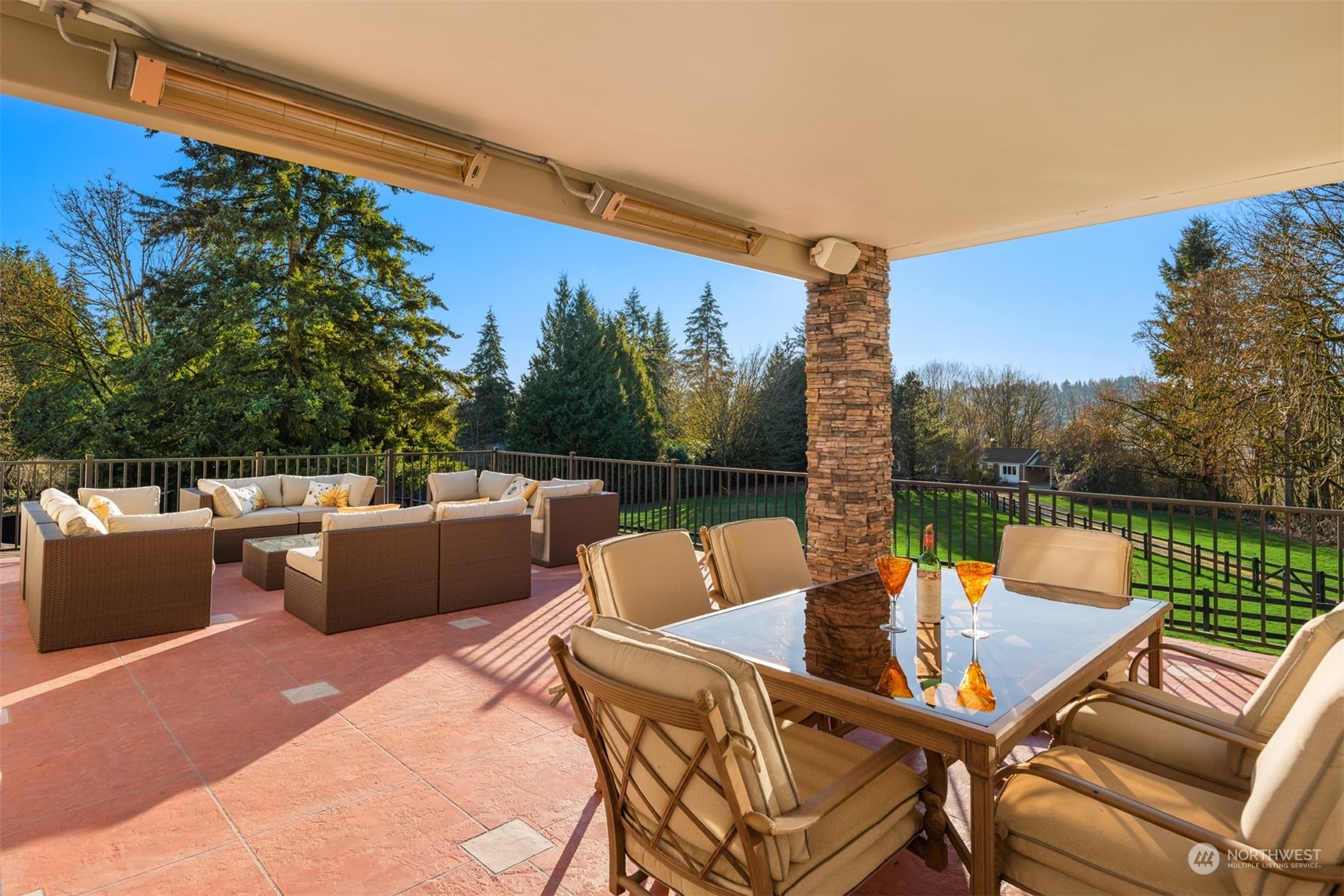 Outdoor deck featuring covered and heated areas with dramatic big sky views and gorgeous valley sunsets.