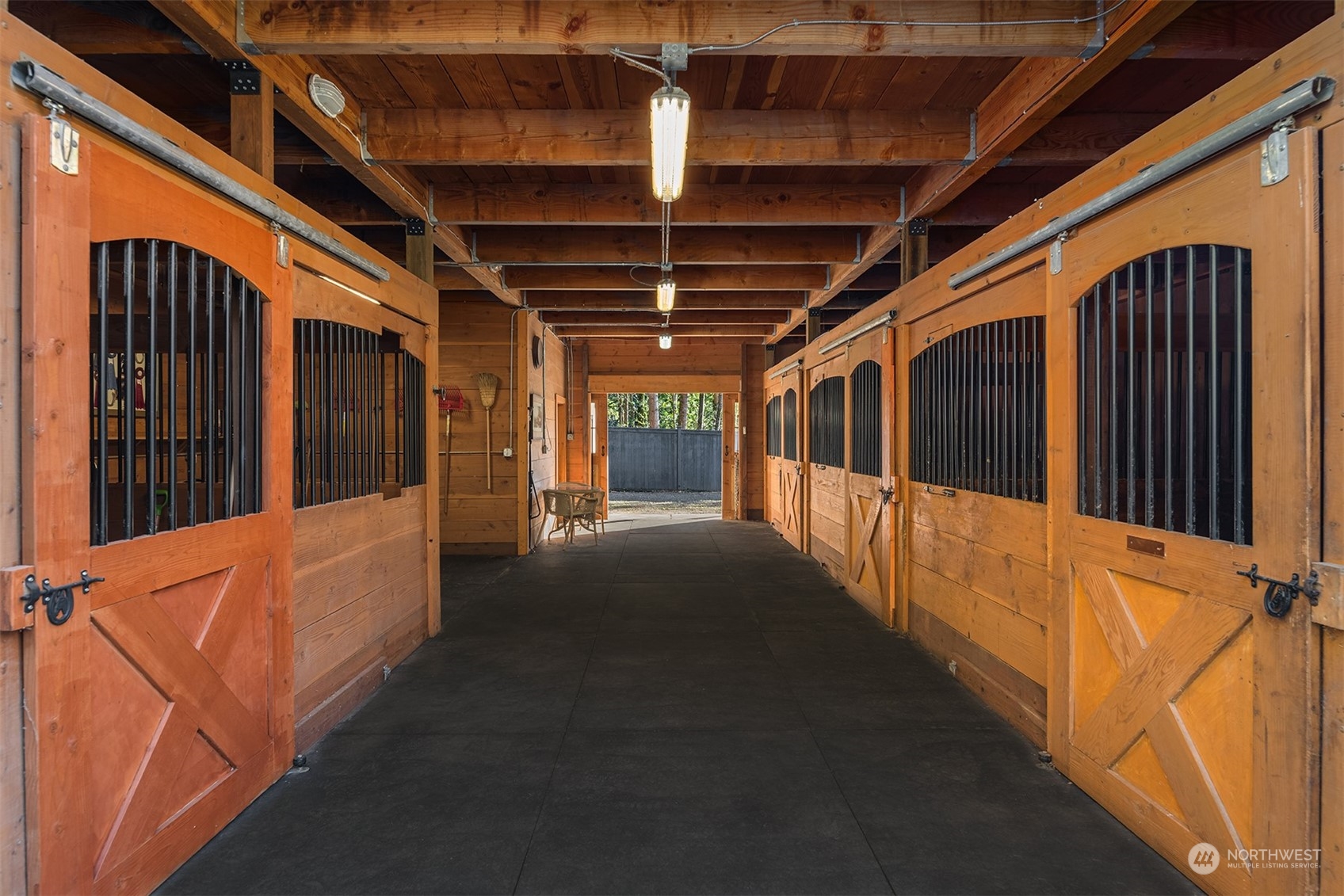 Light, bright and airy, this 4-stall barn is built to last. Impeccably maintained. Move-in ready.