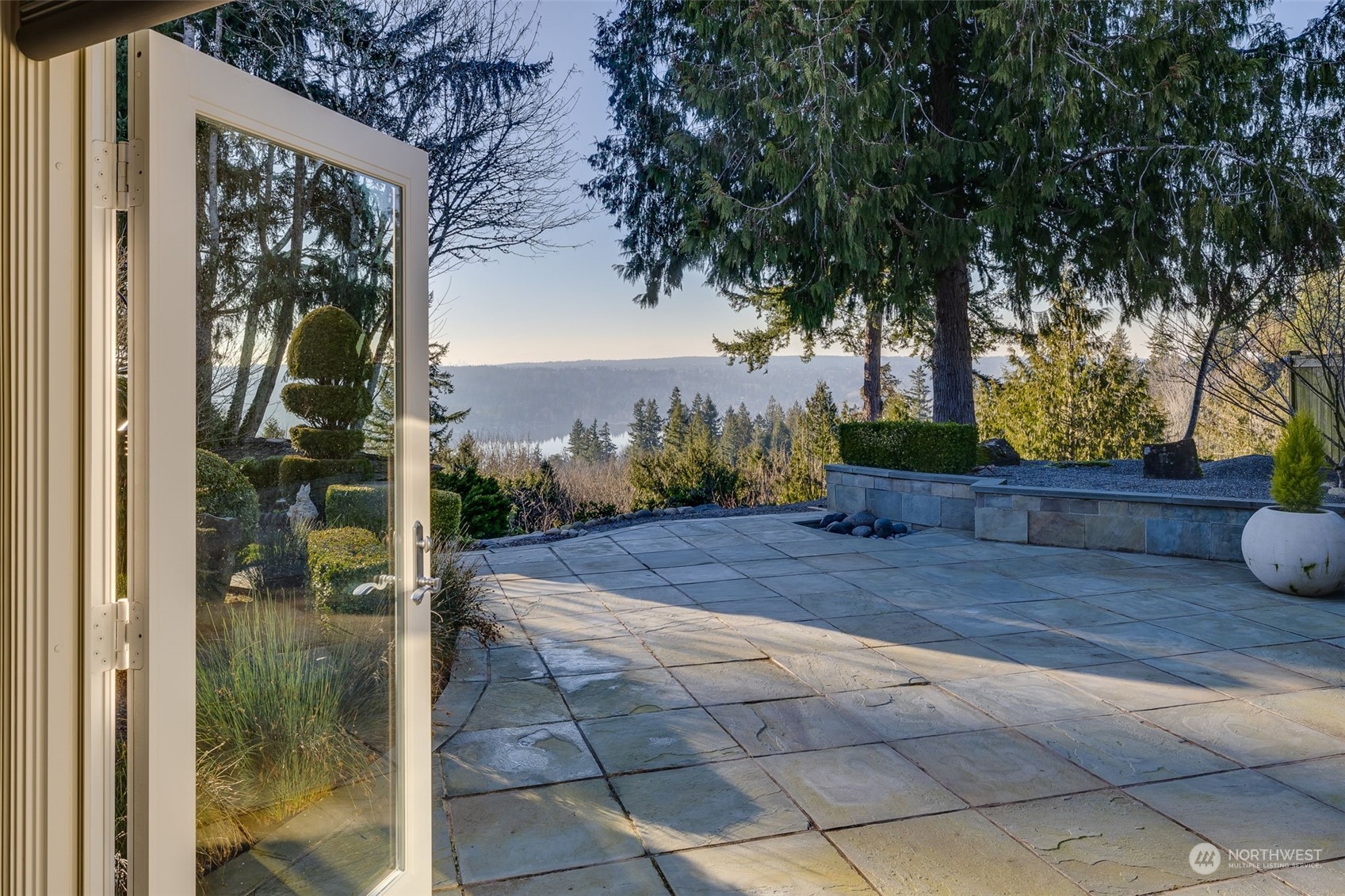 Family room leads straight out to the expansive patio with incredible view.