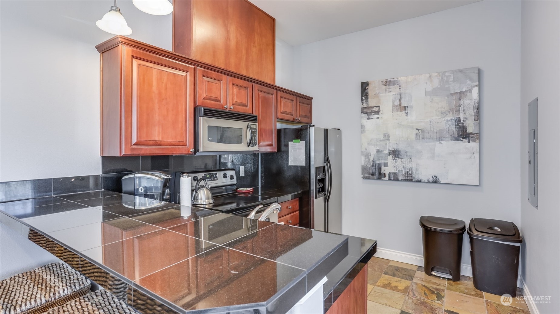 Another view of the kitchen, showcasing the amount of storage and counterspace.