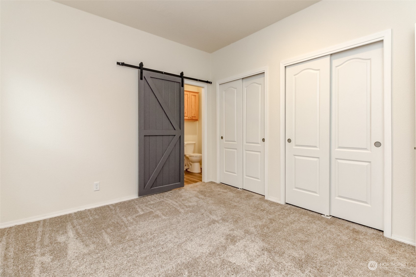 Primary Bedroom with double closets