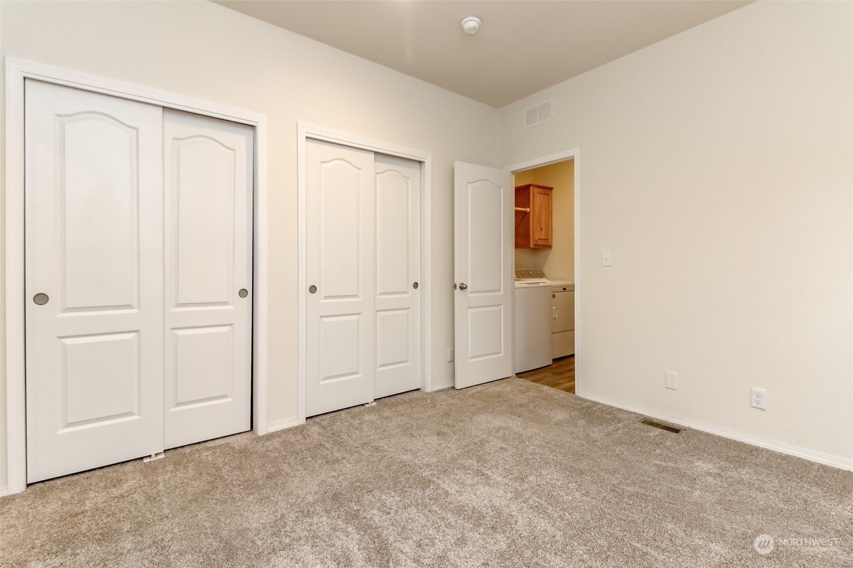 Primary Bedroom with double closets