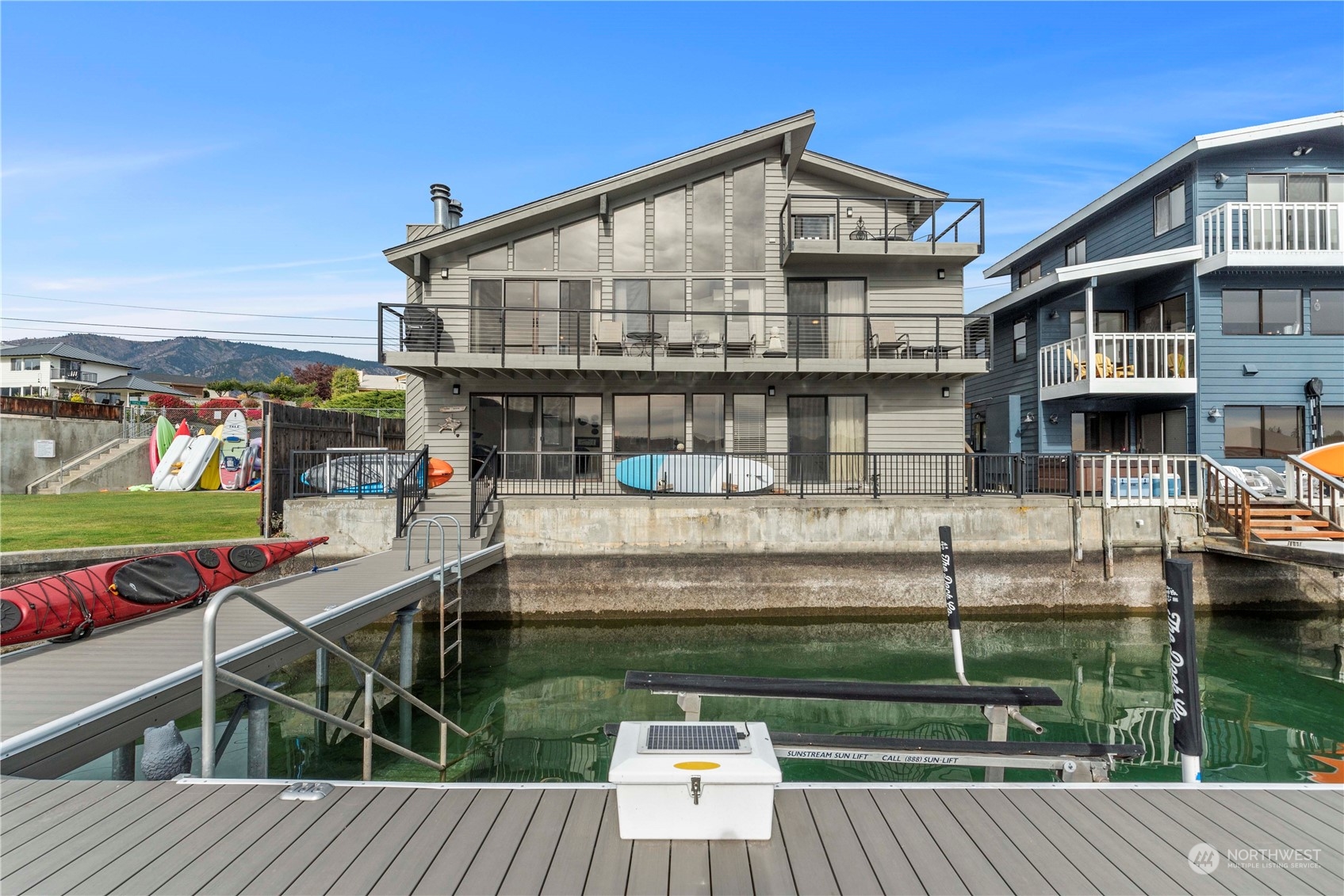 The dock has been replaced from the pilings to the decking, swimming stairs were added, as was a 5K lb boat lift with 5' range for extended season. All that plus a buoy!