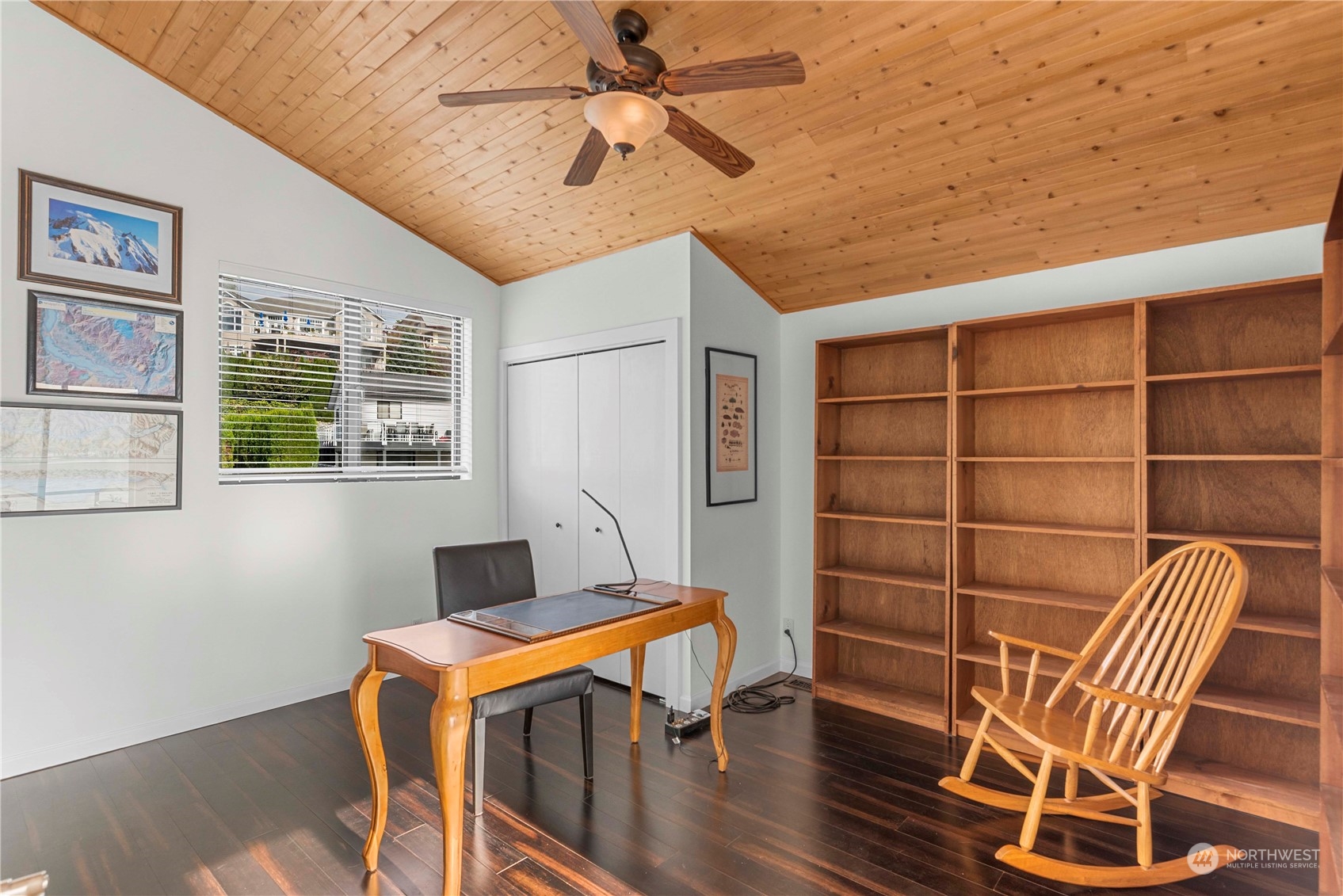 The current owners are using this bedroom as an office.