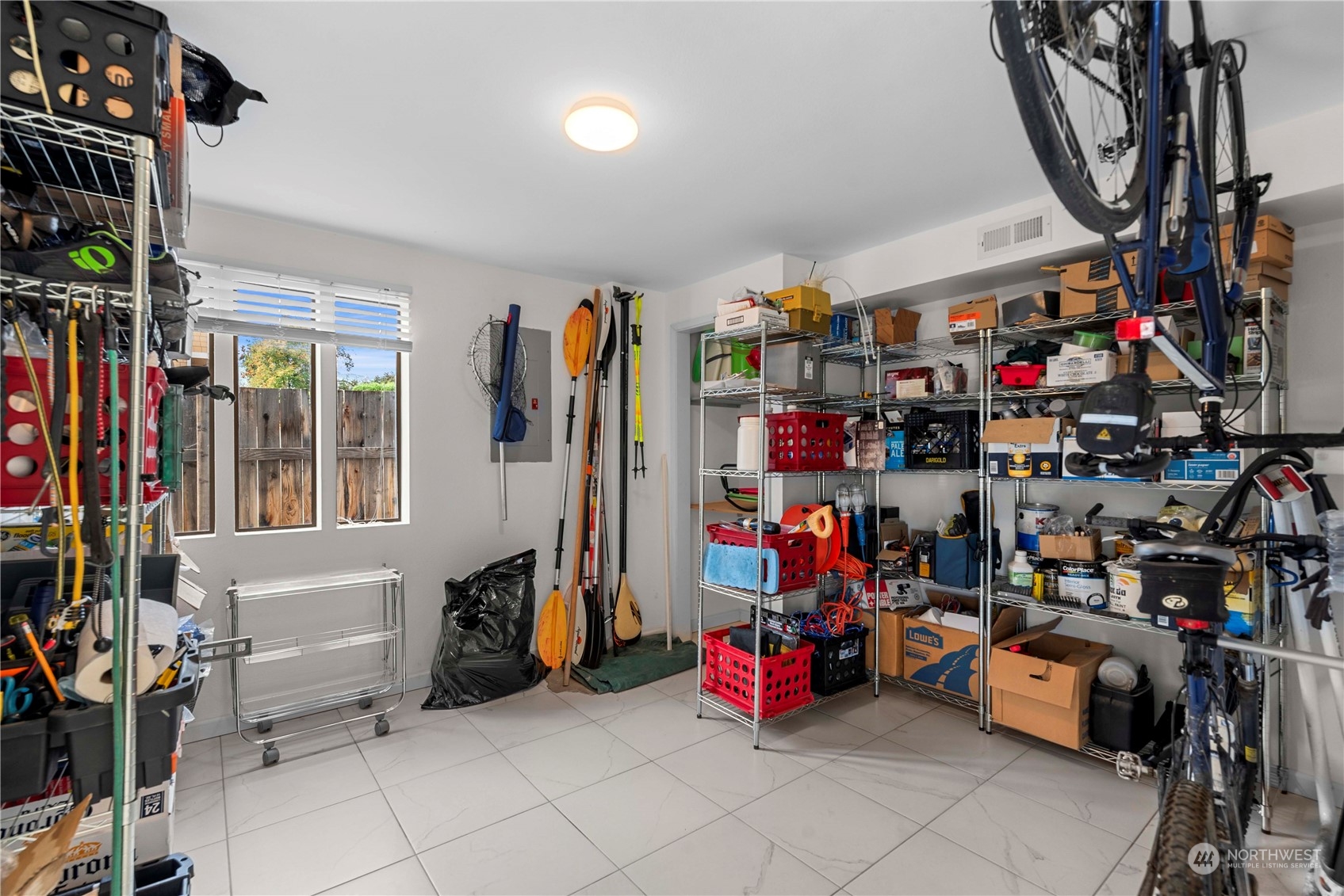 This huge lower level bedroom is currently being used for storage.