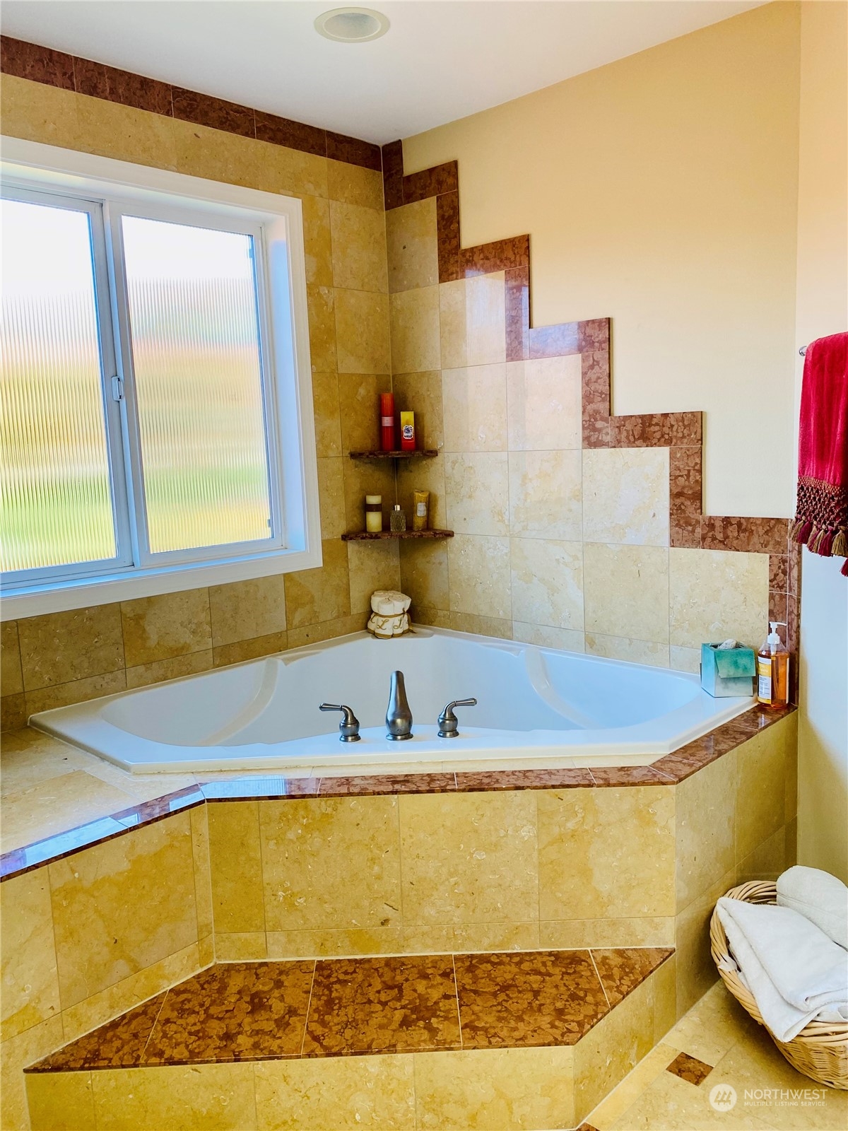 Large Primary bathroom with walk-in shower and double vanity.